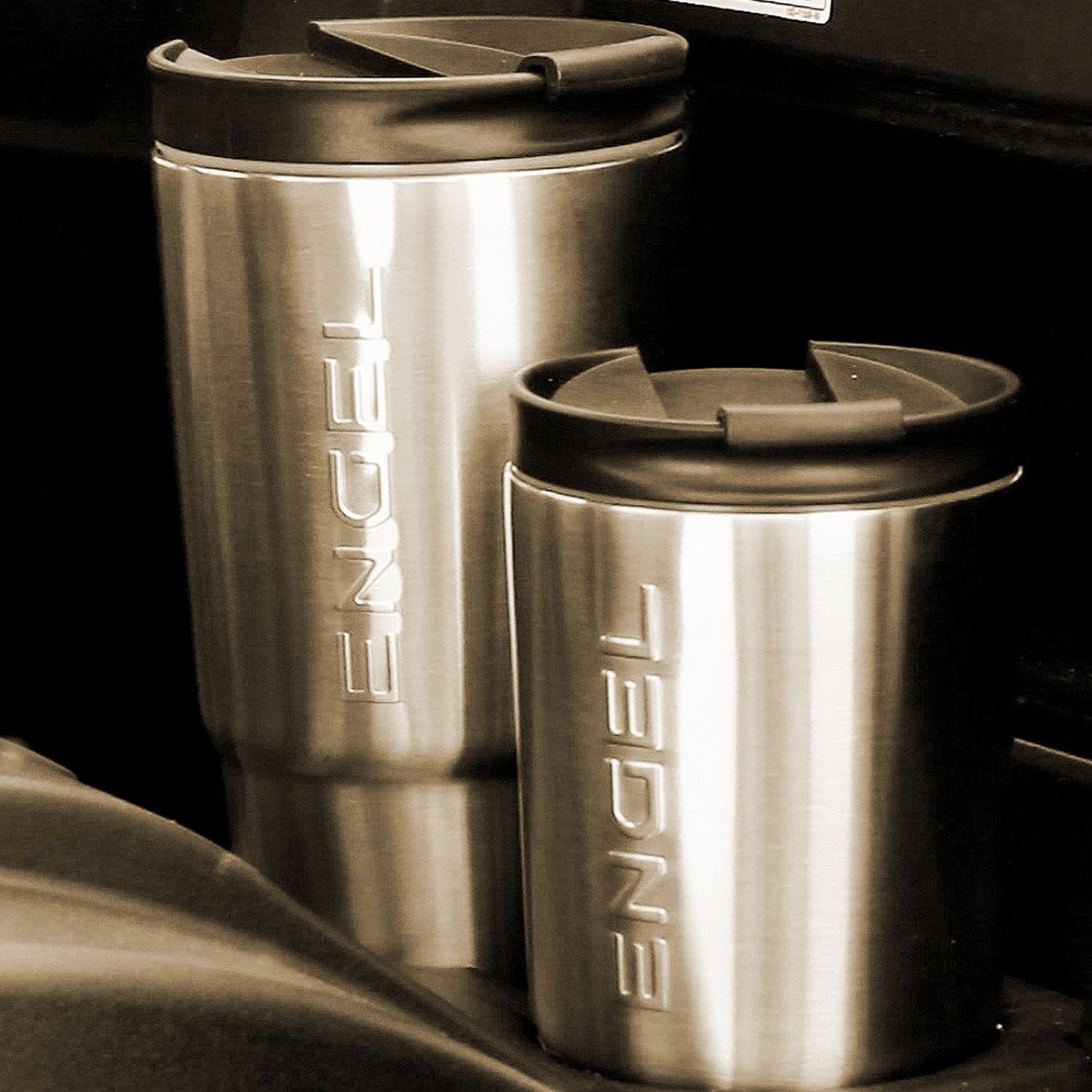 Two Engel 30oz Stainless Steel Vacuum Insulated Tumblers in a black and white photo.